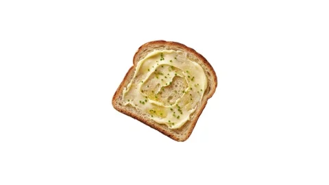 Animation of a floating slices of buttered toast isolated on white Stock Footage 339340634