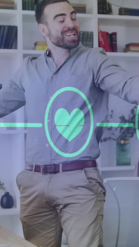 Animation of flowchart of icons over happy caucasian man clapping hands after Stock Footage 344766099