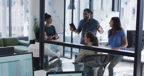Animation of folder icons data processing over diverse business people in office Stock Footage 245976856