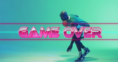 Animation of game over text over neon pattern and african american basketball 스톡 동영상 223303101
