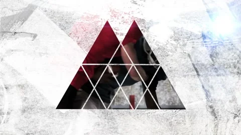 Animation with geometric triangle pattern overlaying textured background in red Stock Footage 326425338