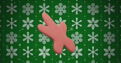 Animation of ginger bread cookie over snow pattern on green background Stock Footage 253482779