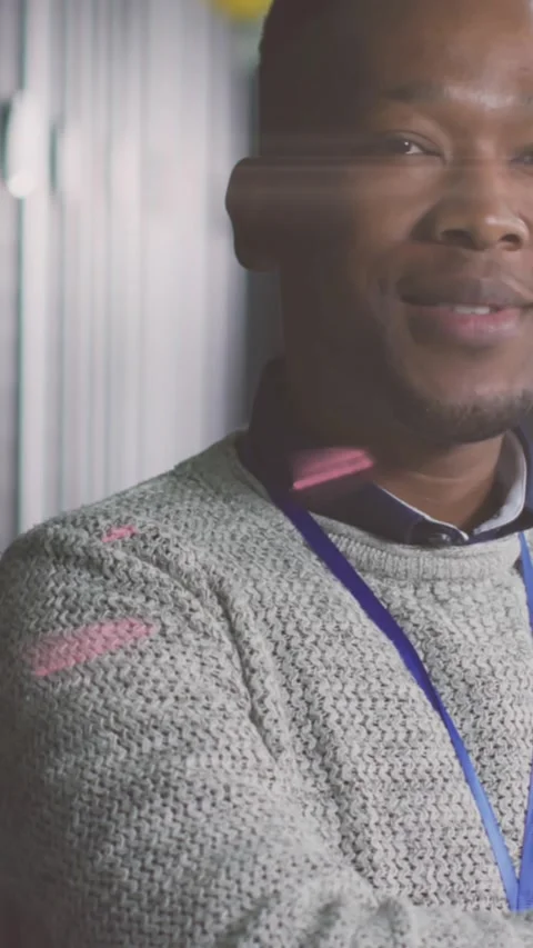Animation of globe and lights over african american man posing in server room Stock Footage 324021787