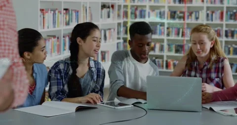 Animation of globe and soundwaves over multiracial students studying over laptop Stock Footage 330478527