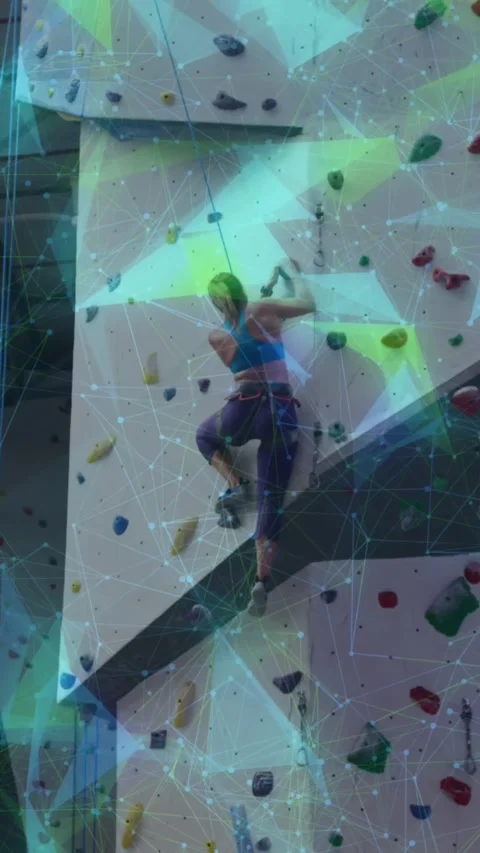 Animation of globe with data processing over caucasian woman climbing wall Stock Footage 323900162