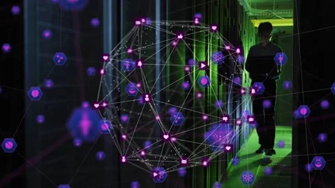 Animation of globe of digital icons over asian male engineer working at computer Stock Footage 330473863