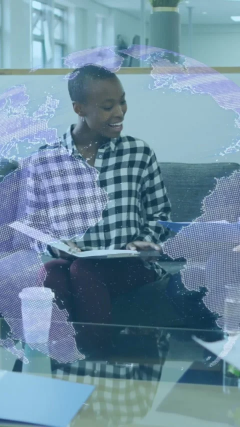 Animation of globe icon over group of diverse colleagues with documents 動画素材 321853155