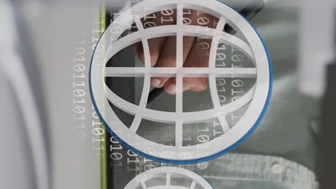 Animation of globe icons, binary coding data processing over businessman in Stock Footage 312581921