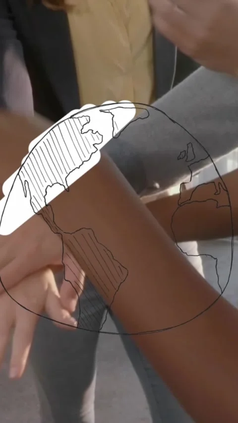 Animation of globe over mid section of diverse colleagues stacking their hands Stock Footage 344594884