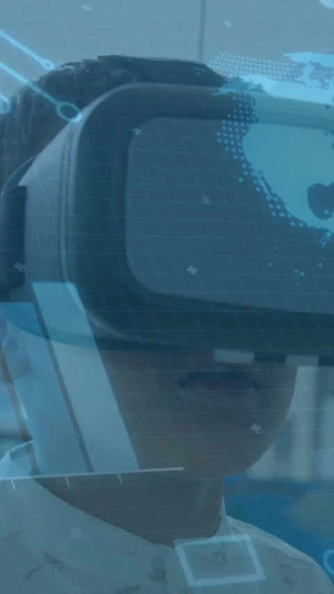 Animation of globe spinning and processor elements over schoolboy wearing vr Stock Footage 342004323