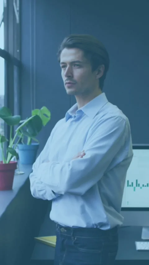 Animation of globes of digital icons over thoughtful caucasian man looking out Stock Footage 344746103