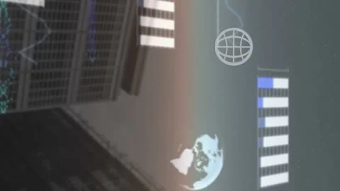Animation of globes, graphs and computer language against low angle view of Stock Footage 312488791