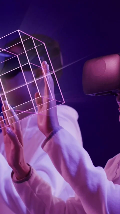 Animation of glowing 3d shapes over asian people using vr headset Stock Footage 323898191
