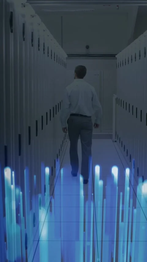 Animation of glowing blue light trails over rear view of male engineer walking Stock Footage 322559924