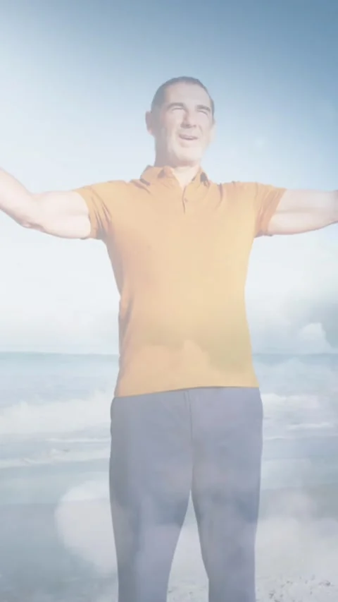 Animation of glowing light over happy senior man by seaside Stock-Footage 342097448