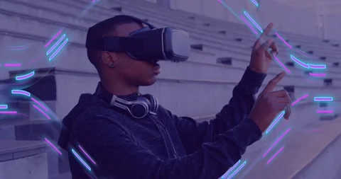 Animation of glowing light trails of data transfer over african american man in Stock Footage 328091267