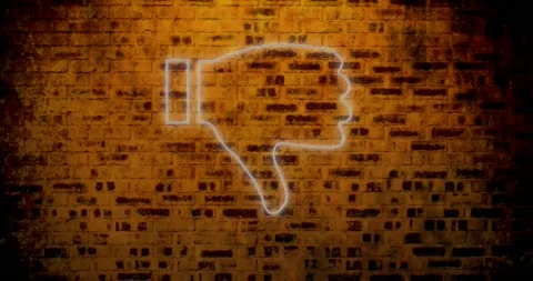 Animation of glowing neon thumb down icon on brick wall 库存影片 170009969
