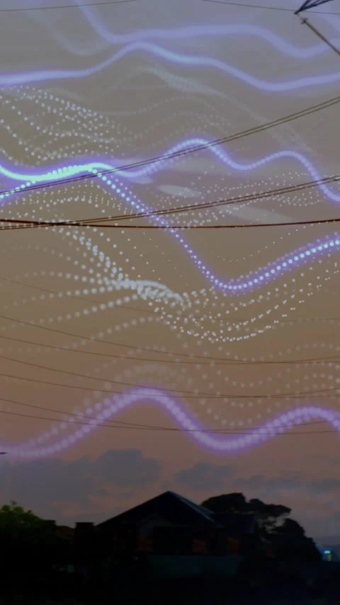 Animation of glowing waves overlaying silhouetted power lines against sky Stock Footage 344370544