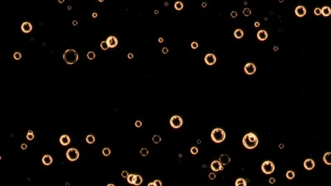 Animation gold bubble particles flying on black abstract Background Stock Footage 310386545