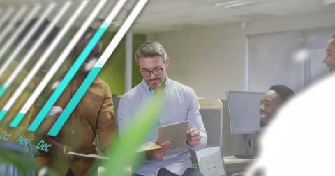 Animation of graph, globe and computer language, diverse coworkers sharing ideas Stock Footage 327275499