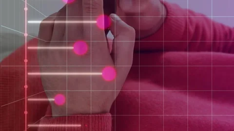 Animation of graph on grid pattern over midsection of man standing and using Stock Footage 312675012