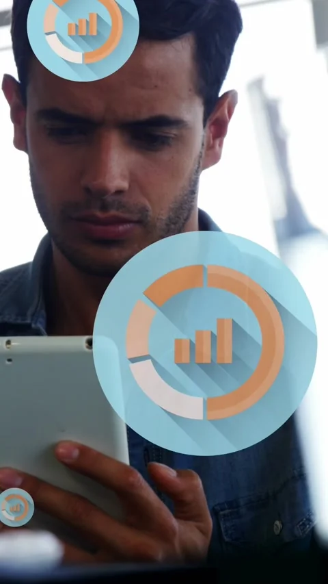 Animation of graph icon in circles over man scrolling on digital tablet in Stock Footage 320811556