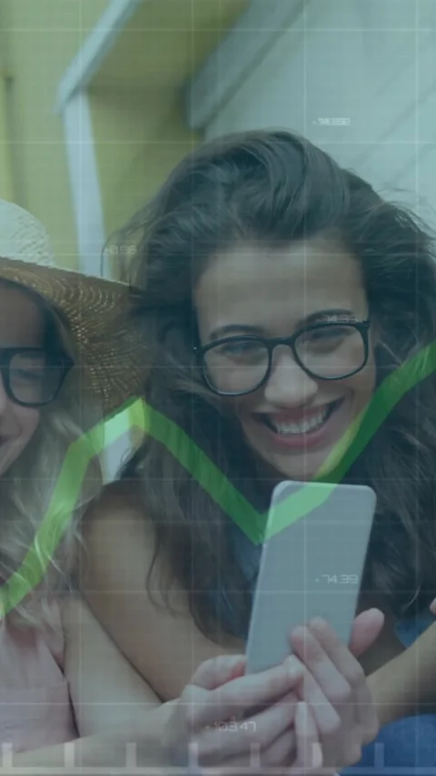 Animation of graph over diverse friends watching old memories on smartphone Stock Footage 323578903