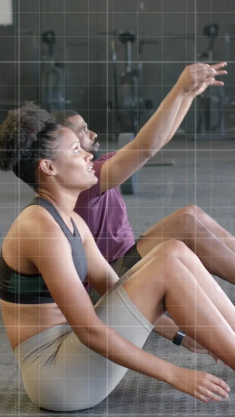 Animation of graph processing over diverse man and woman cross training with Stock Footage 323783036