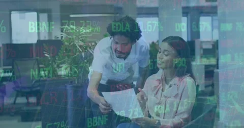 Animation of graph, trading board over diverse coworkers discussing documents in Stock Footage 326095547