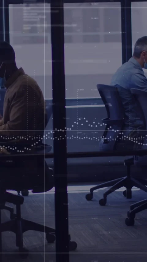 Animation of graphs and abstract pattern over diverse coworkers wearing mask Stock Footage 321666782