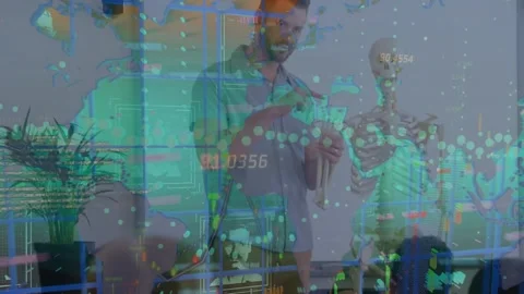 Animation of graphs and data over caucasian male teacher and class of diverse Stock Footage 327782969