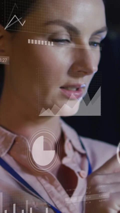 Animation of graphs and processing circles over caucasian woman working in Stock Footage 342608041