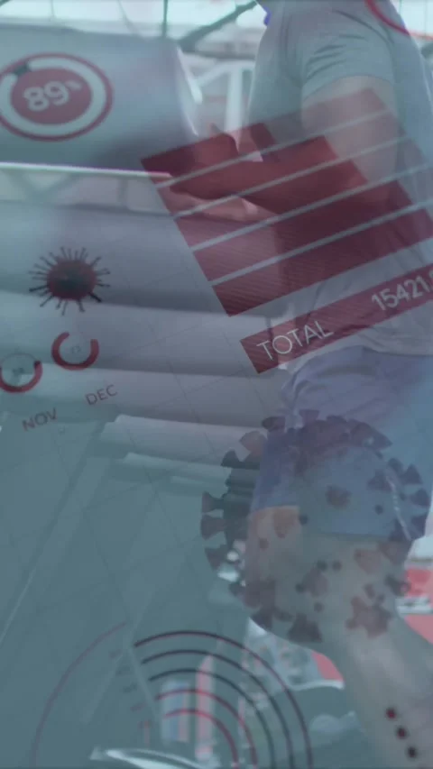 Animation of graphs and statistics over african american man wearing face masks Stock Footage 341918794