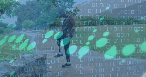 Animation of graphs, binary codes over african american handicap athlete doing Stock Footage 329926918