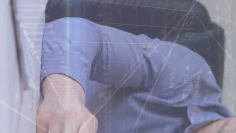 Animation of graphs, binary codes, trading board over caucasian businessman Stock Footage 313166449