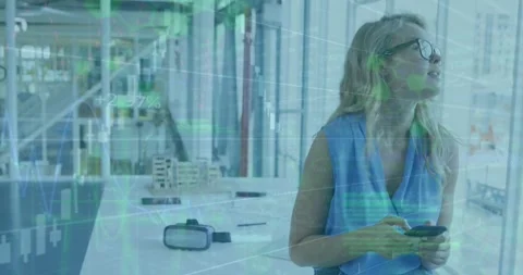 Animation of graphs, computer language on caucasian woman using cellphone and Stock Footage 330658189