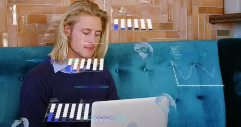 Animation of graphs, globes and computer language, caucasian man working on Stock Footage 326032887