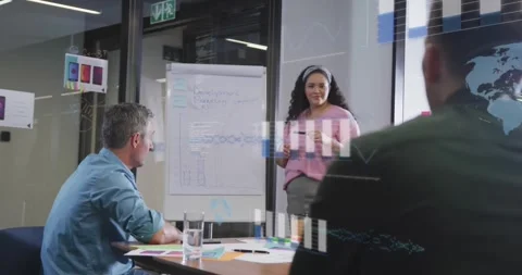 Animation of graphs, globes, computer language over diverse coworkers discussing Stock Footage 327361458