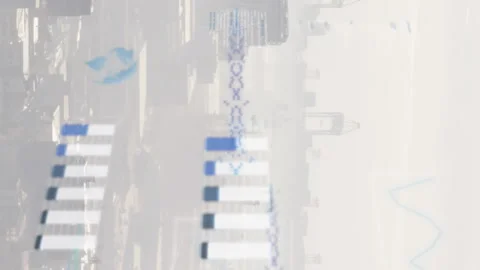 Animation of graphs, globes, soundwaves and computer language over fog covered Stock Footage 314124357
