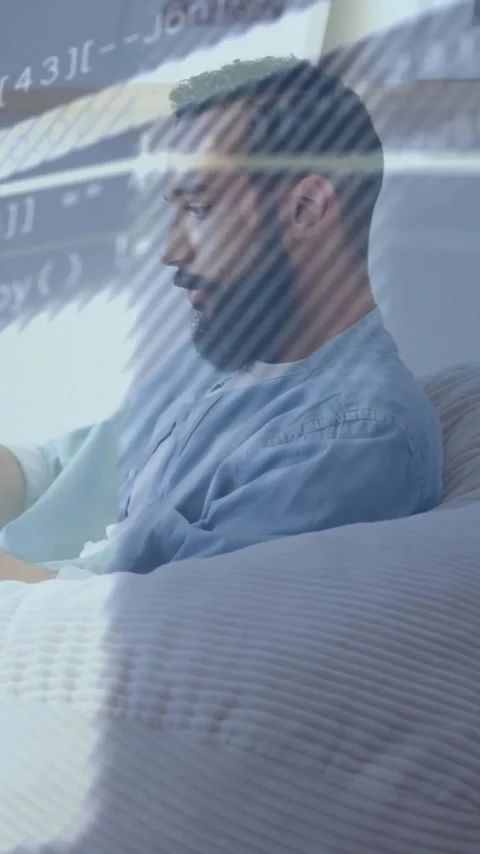 Animation of graphs, lines and computer language over caucasian man using Stock Footage 323578901