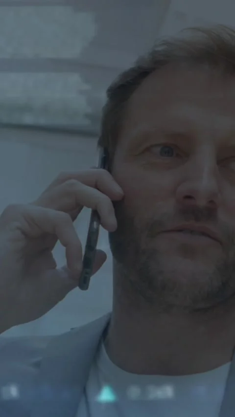 Animation of graphs, loading circles and trading board, caucasian man talking on Stock Footage 320160602