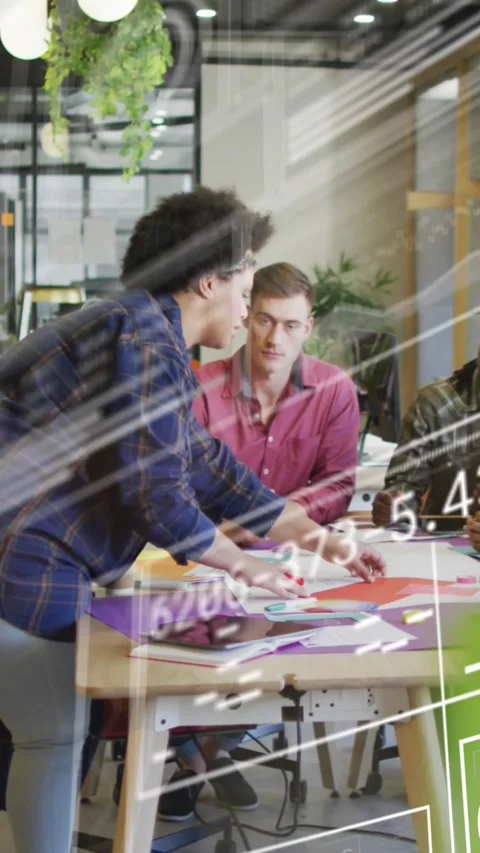 Animation of graphs, loading circles, changing numbers, diverse coworkers Stock Footage 344636421