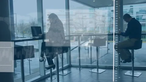 Animation of graphs, map, circuit board pattern, biracial woman working on Stock Footage 236727188