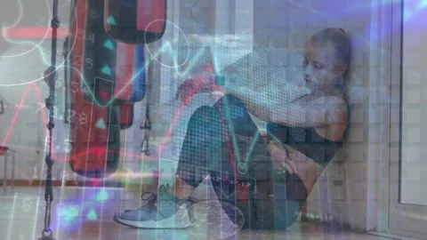 Animation of graphs, map, surveillance camera over tired caucasian female boxer Stock Footage 327529340
