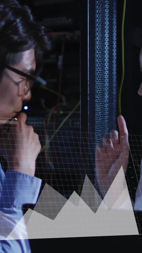 Animation of graphs over diverse man and woman working in server room Stock Footage 342594090