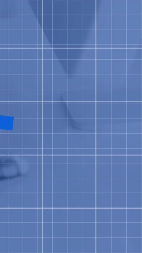 Animation of graphs over grid pattern against keyboard and computer on desk in Stock Footage 321381524