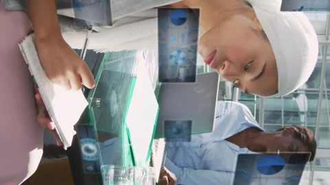 Animation of graphs, radars and computer language, diverse coworkers working and Stock Footage 312533943