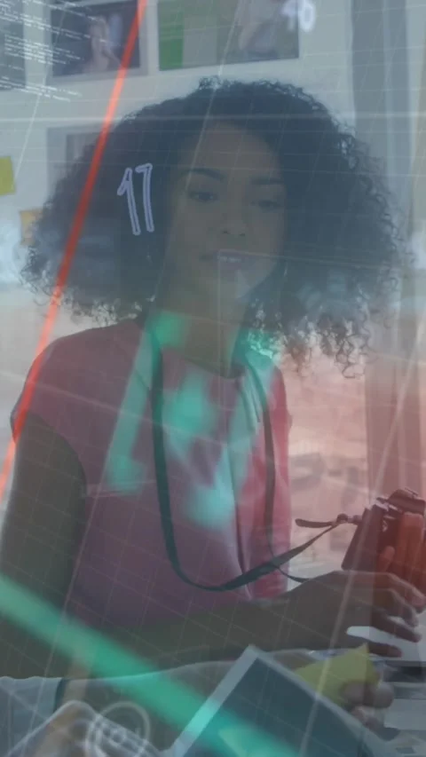 Animation of graphs, symbols, computer language, diverse female coworkers Stock Footage 320983500