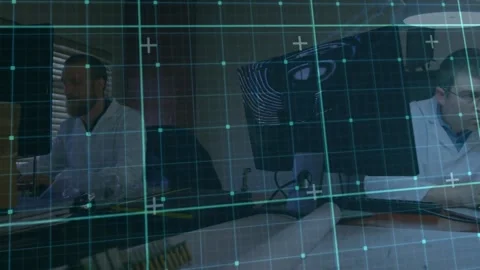 Animation of grid pattern over caucasian male engineers working on laptop at 库存影片 246961430