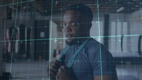 Animation of grid pattern, tired african american man with skipping rope around Stock Footage 247690741